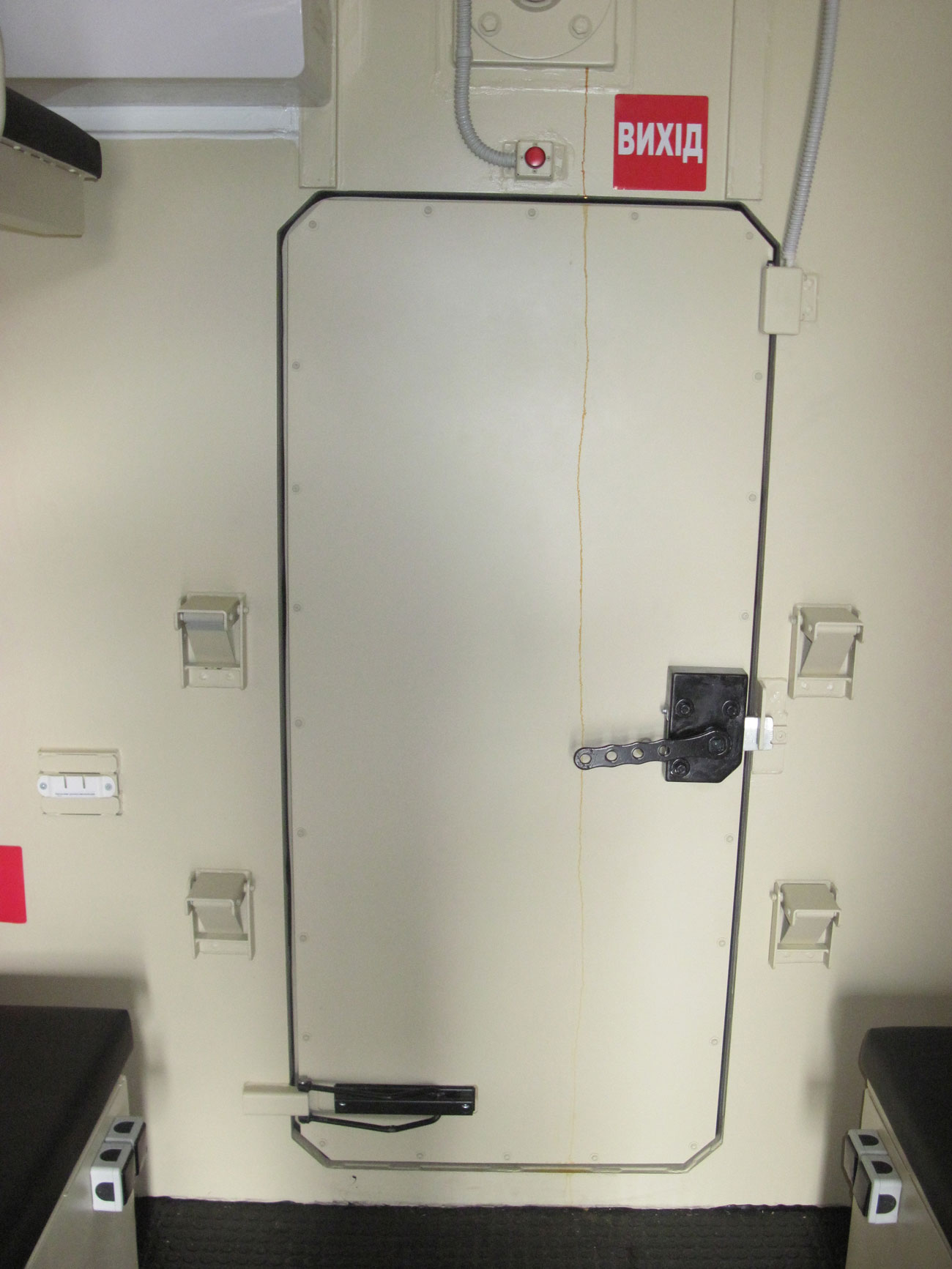 Installation or deployment of a protective shelter using a crane.